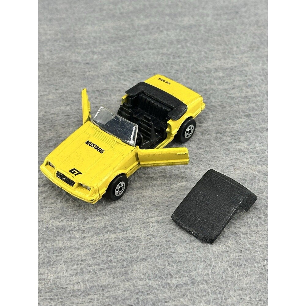ROAD CHOMPS #11 Yellow Mustang Convertible Die Cast Car